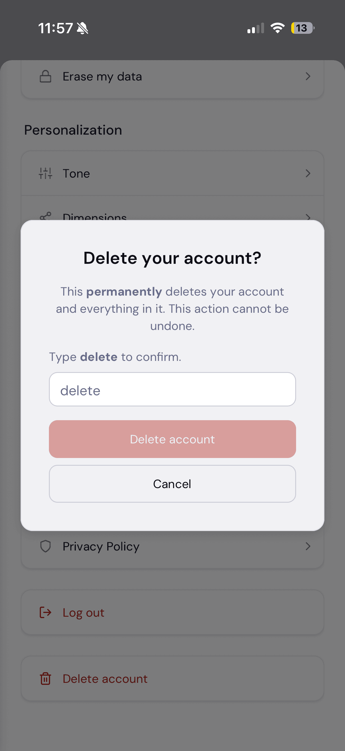 Mobile delete-account confirmation dialog requiring the user to type delete, its confirm button on the destructive token.